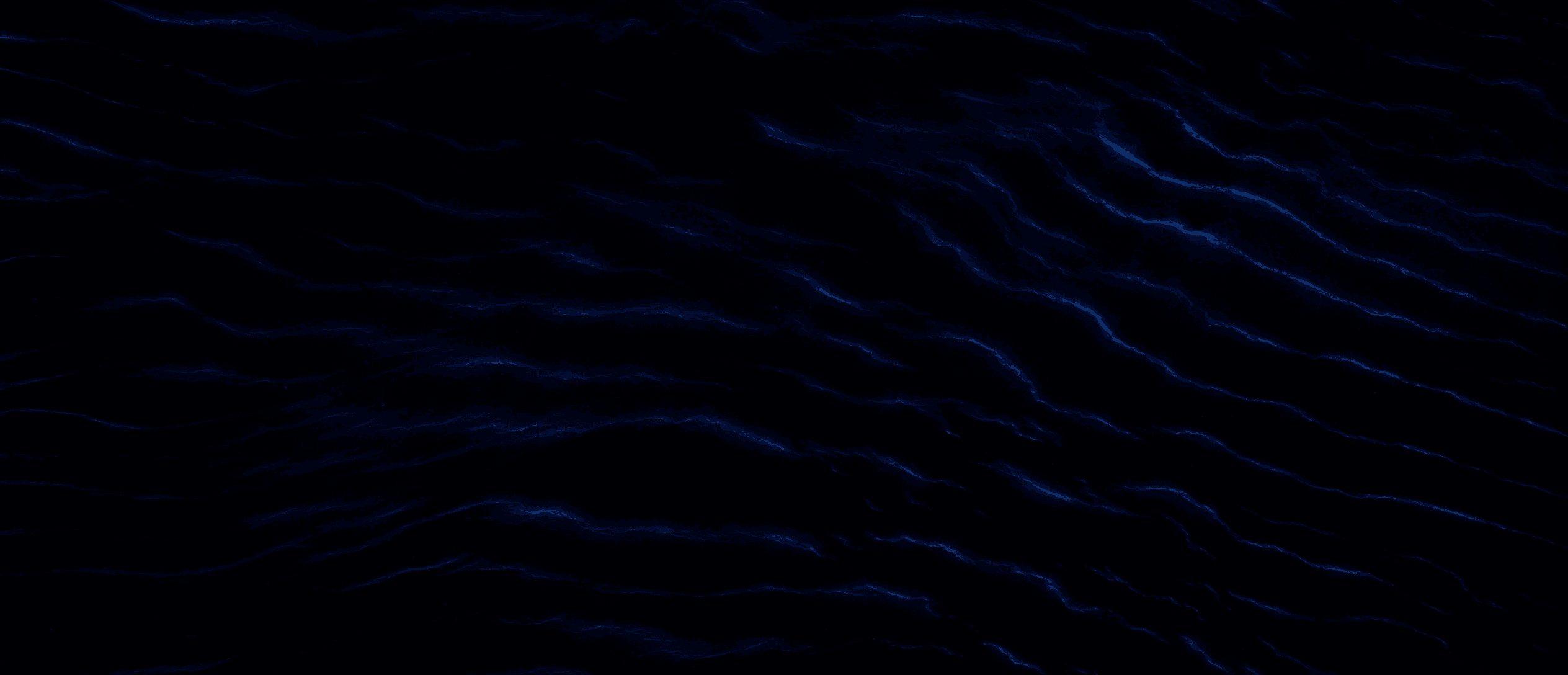 Black ocean swells traced by ultramarine bioluminescence